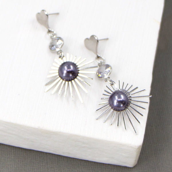 Contemporary sunburst motif earrings with faux grey pearls