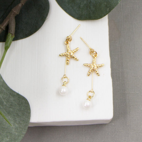 Gold plated little starfish earrings with delicate pearl dangle