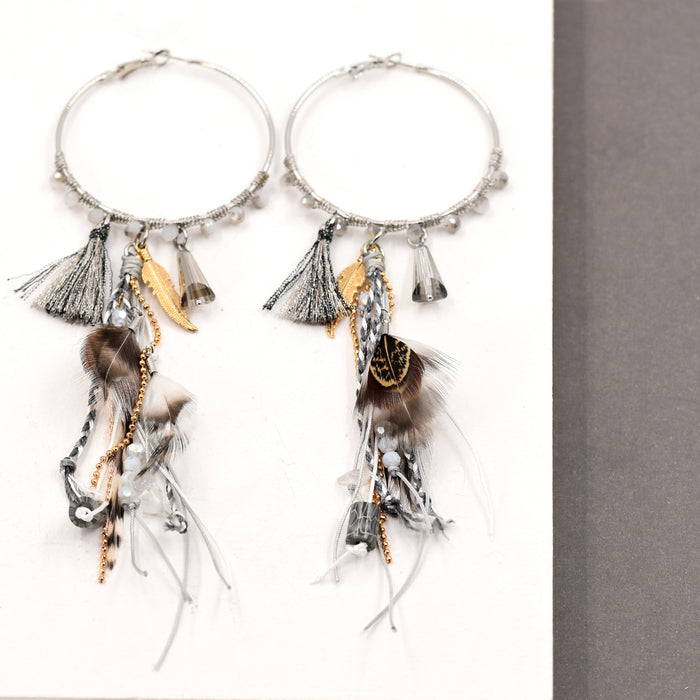 Boho hoop earrings with muted beads and feathers