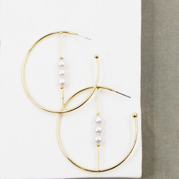 Contemporary hoop earrings with cross bar and faux pearl elements