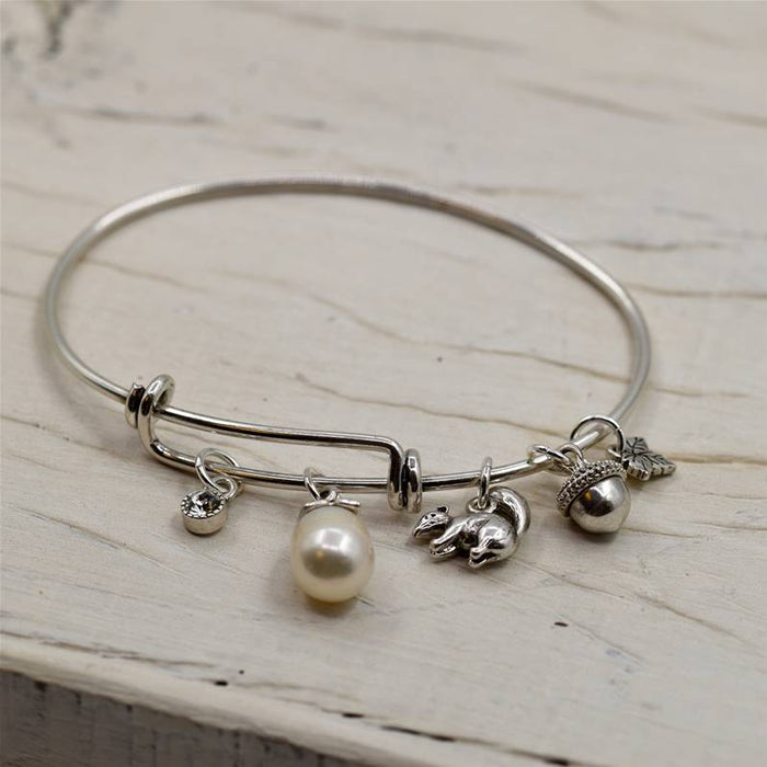 Adjustable bangle with woodland charms and real pearl