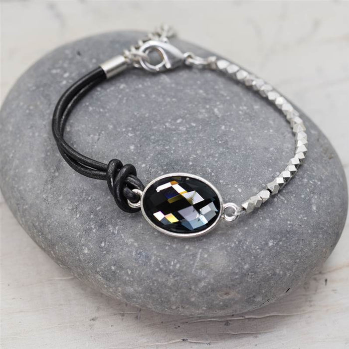 Crystal feature and leather bracelet with little facetted beads